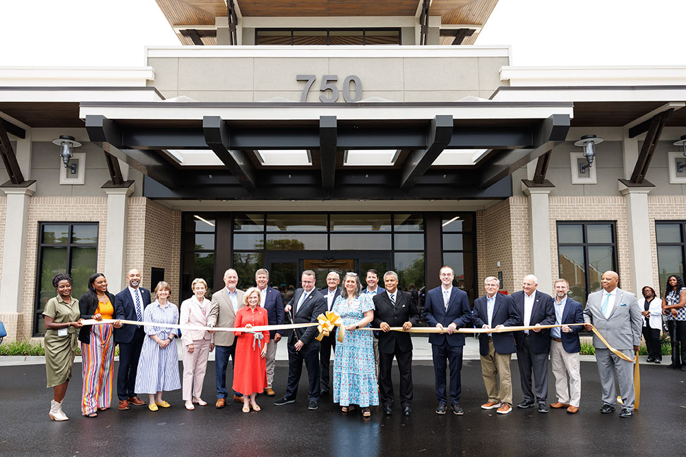 Representatives mark the opening of a new Mercer-affiliated behavioral health facility in Macon.